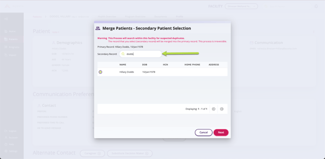 An arrow is pointing to the secondary patient area of the screen.